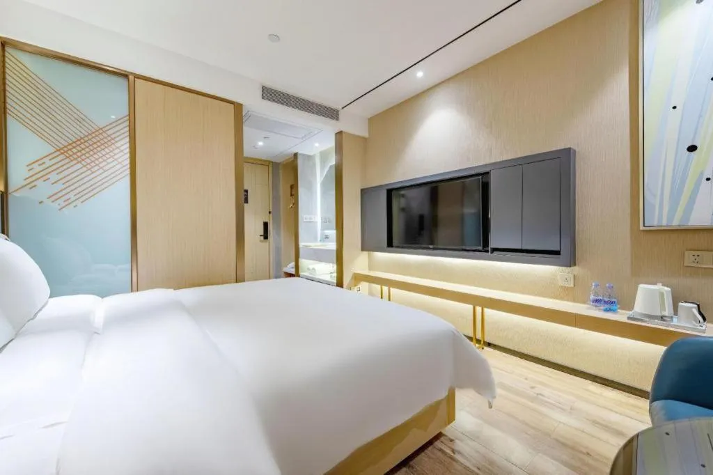 Bed in ZMAX Hotels Shenzhen Lianhuacun Metro Station