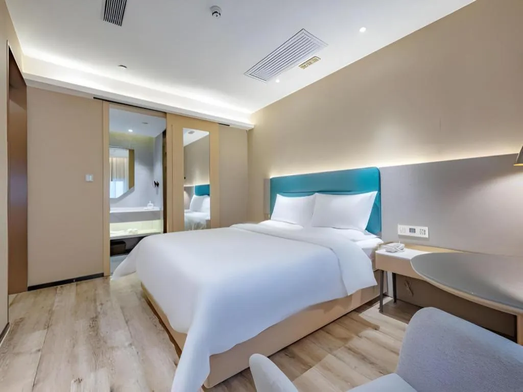 Bed in ZMAX Hotels Shenzhen Lianhuacun Metro Station