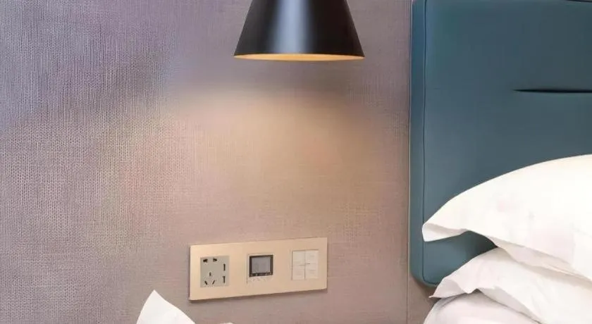 Bed in ZMAX Hotels Shenzhen Lianhuacun Metro Station