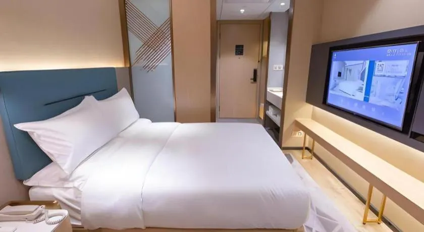 Bed in ZMAX Hotels Shenzhen Lianhuacun Metro Station