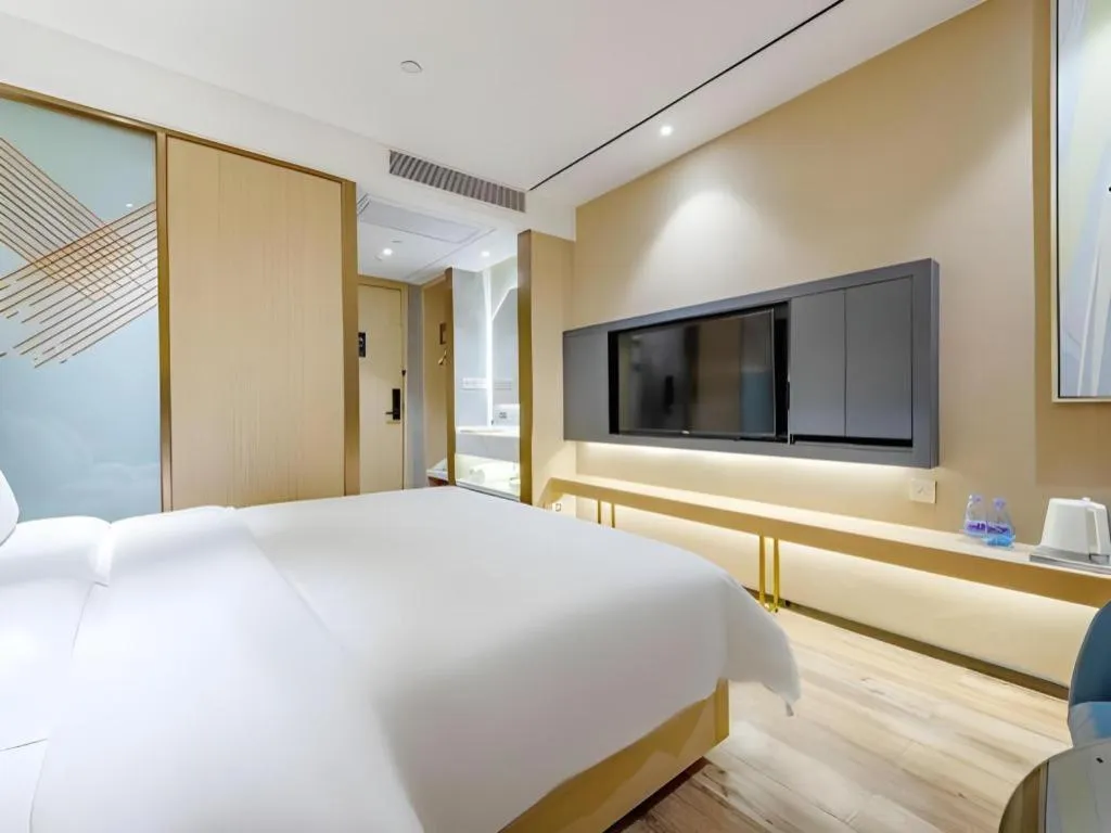 Bed in ZMAX Hotels Shenzhen Lianhuacun Metro Station