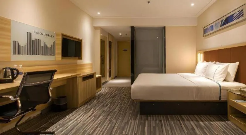 Bed in City Comfort Inn Wuhan Wangjiawan Sixin Avenue Metro Station