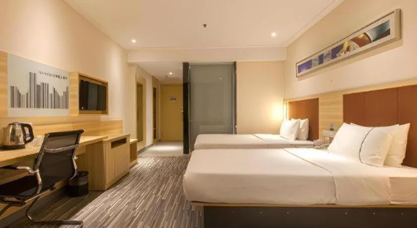 Bed in City Comfort Inn Wuhan Wangjiawan Sixin Avenue Metro Station