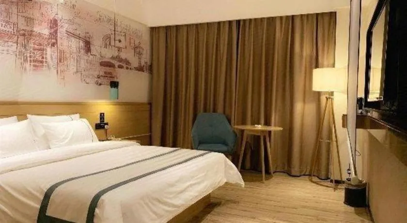 Bed in City Comfort Inn Dongguan Wangniudun