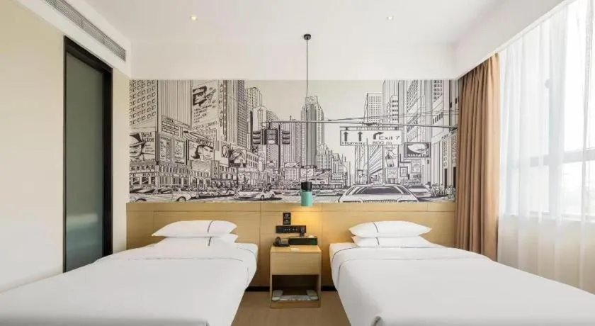 Bed in City Comfort Inn Dongguan Wangniudun