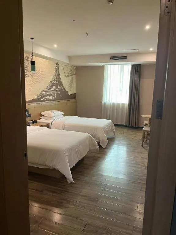 Bed in City Comfort Inn Dongguan Wangniudun