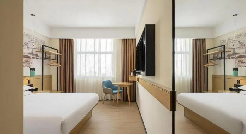 Bed in City Comfort Inn Dongguan Wangniudun