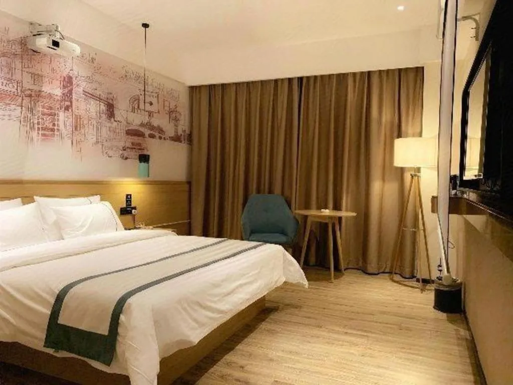 Bed in City Comfort Inn Dongguan Wangniudun