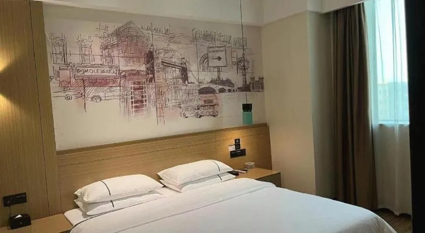 Bed in City Comfort Inn Dongguan Wangniudun