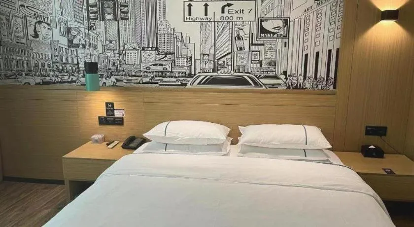 Bed in City Comfort Inn Dongguan Wangniudun