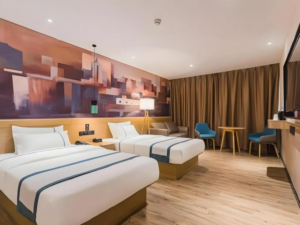 Bed in City Comfort Inn Dongguan Wangniudun