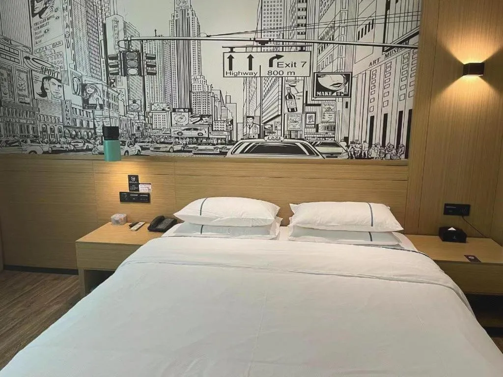 Bed in City Comfort Inn Dongguan Wangniudun