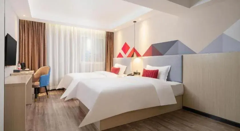 Bed in Borrman Hotel Dongguan Houjie Wanda Plaza Liaoxia Metro Station Bed in Borrman Hotel Dongguan Houjie Wanda Plaza Liaoxia Metro Station