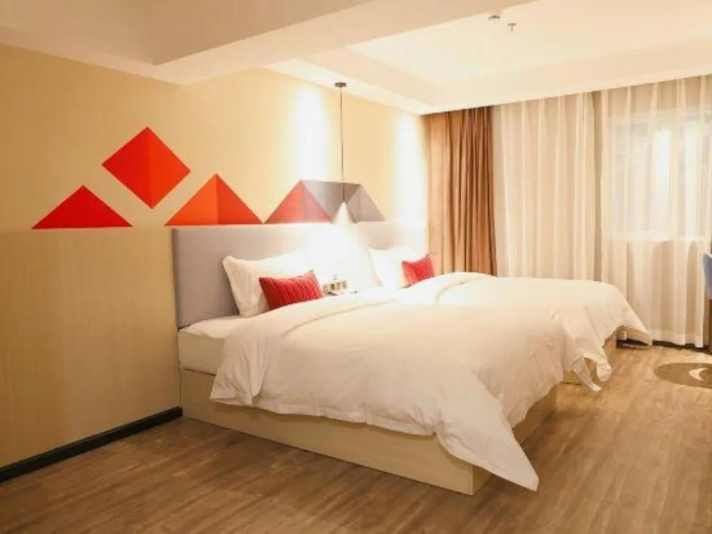 Bed in Borrman Hotel Dongguan Houjie Wanda Plaza Liaoxia Metro Station