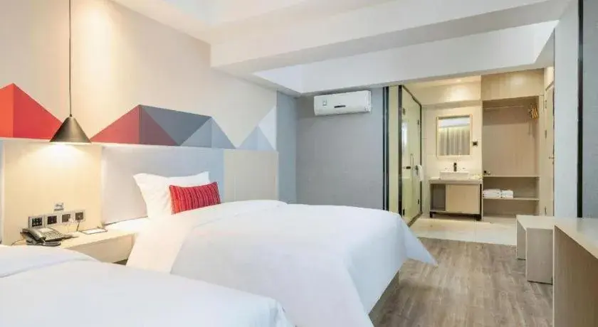 Bed in Borrman Hotel Dongguan Houjie Wanda Plaza Liaoxia Metro Station Bed in Borrman Hotel Dongguan Houjie Wanda Plaza Liaoxia Metro Station