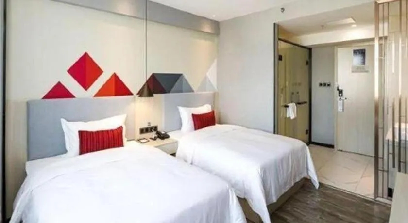 Bed in Borrman Hotel Dongguan Houjie Wanda Plaza Liaoxia Metro Station