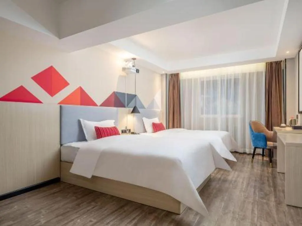 Bed in Borrman Hotel Dongguan Houjie Wanda Plaza Liaoxia Metro Station