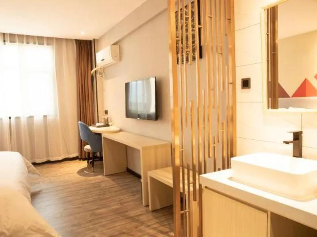 Bed in Borrman Hotel Dongguan Houjie Wanda Plaza Liaoxia Metro Station