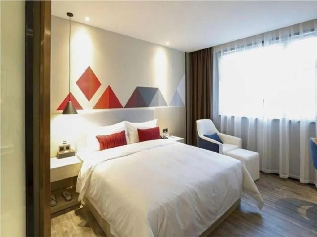 Bed in Borrman Hotel Dongguan Houjie Wanda Plaza Liaoxia Metro Station
