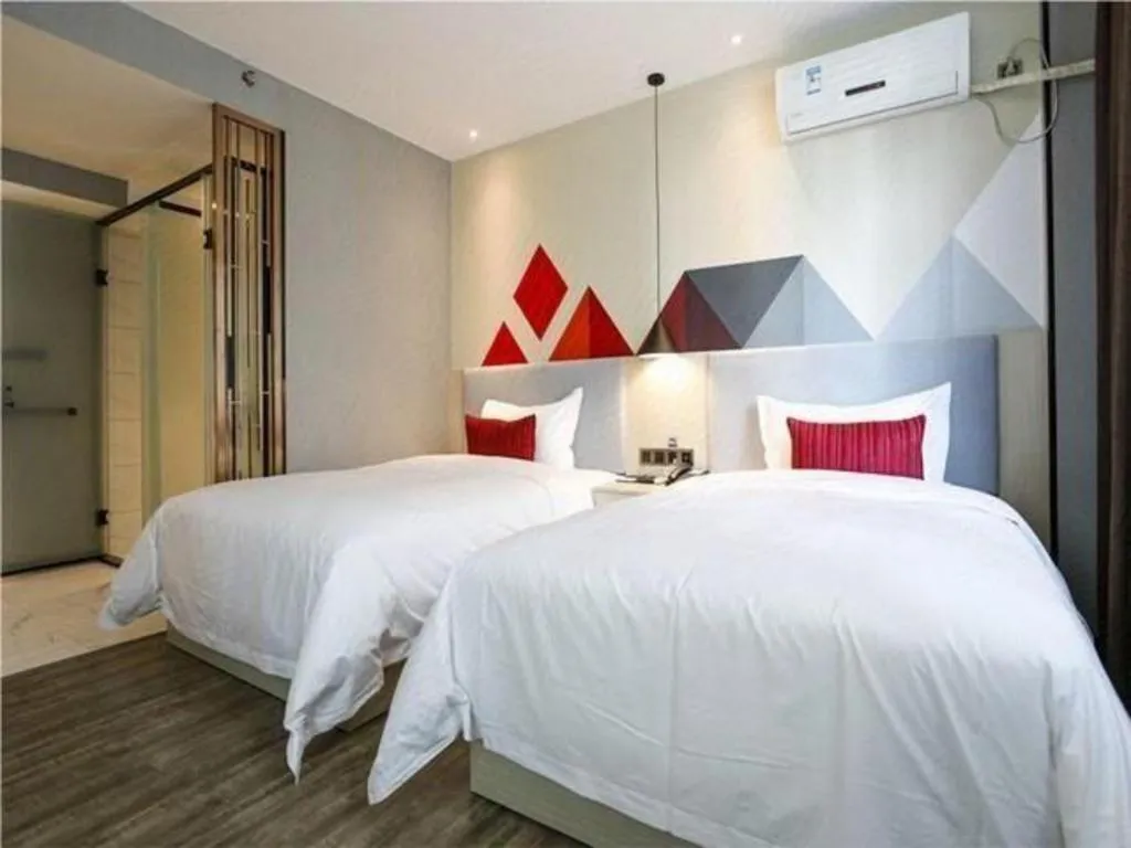 Bed in Borrman Hotel Dongguan Houjie Wanda Plaza Liaoxia Metro Station