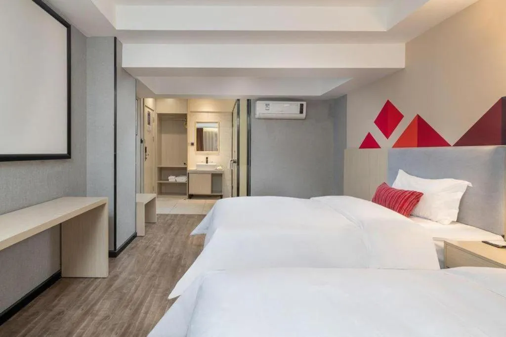 Bed in Borrman Hotel Dongguan Houjie Wanda Plaza Liaoxia Metro Station