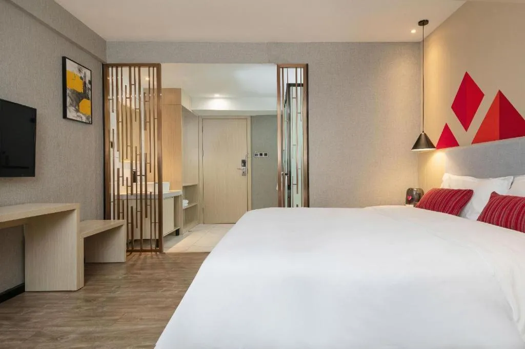 Bed in Borrman Hotel Dongguan Houjie Wanda Plaza Liaoxia Metro Station