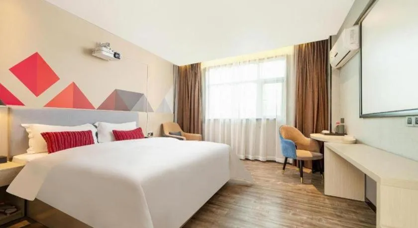 Bed in Borrman Hotel Dongguan Houjie Wanda Plaza Liaoxia Metro Station