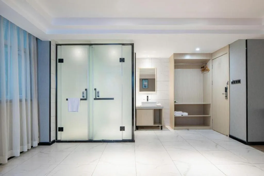 Bed in Borrman Hotel Dongguan Houjie Wanda Plaza Liaoxia Metro Station