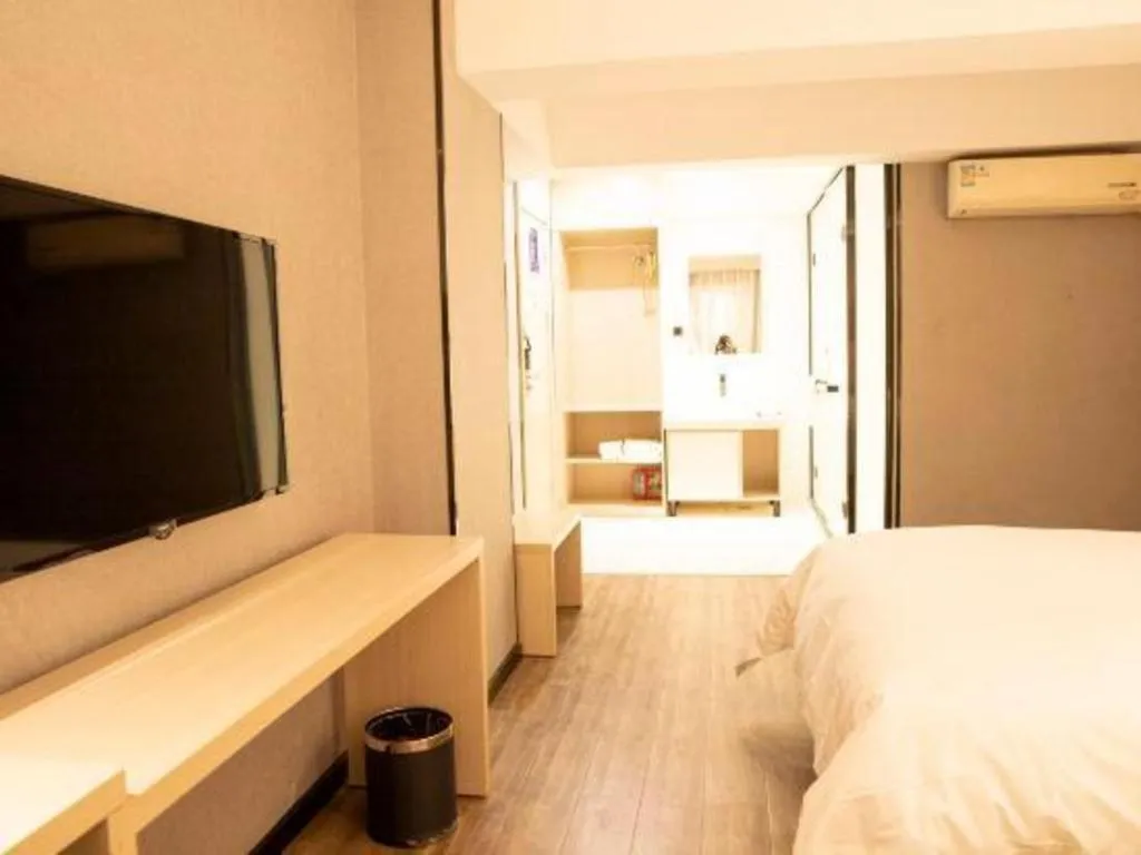 Bed in Borrman Hotel Dongguan Houjie Wanda Plaza Liaoxia Metro Station