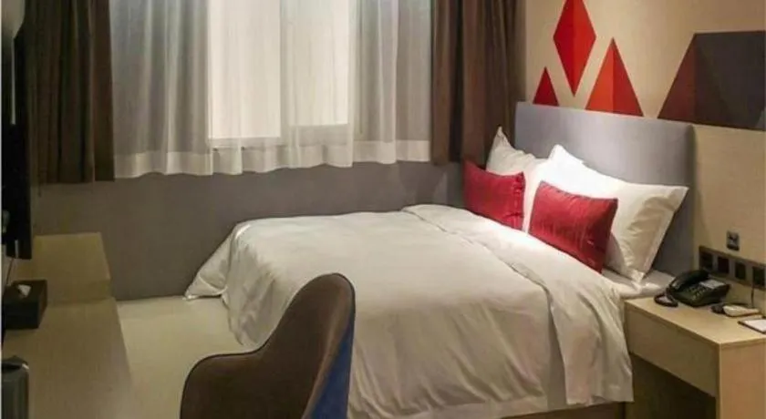 Bed in Borrman Hotel Dongguan Houjie Wanda Plaza Liaoxia Metro Station