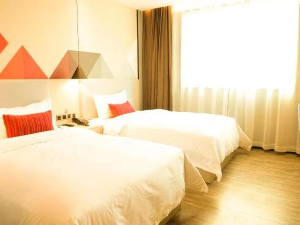 Bed in Borrman Hotel Dongguan Houjie Wanda Plaza Liaoxia Metro Station