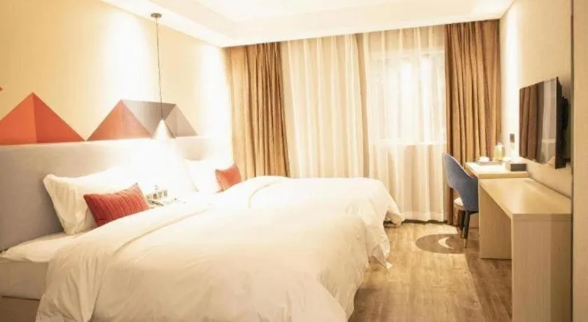 Bed in Borrman Hotel Dongguan Houjie Wanda Plaza Liaoxia Metro Station