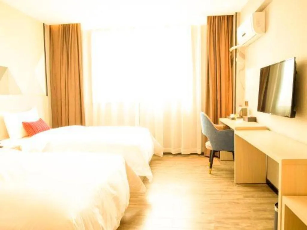 Bed in Borrman Hotel Dongguan Houjie Wanda Plaza Liaoxia Metro Station