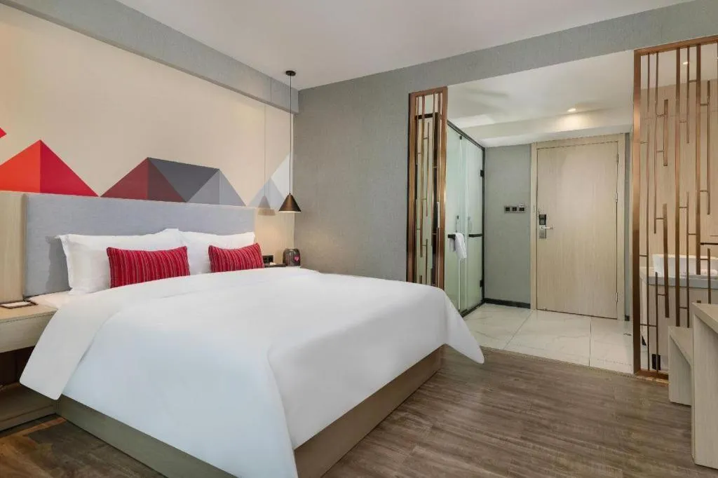 Bed in Borrman Hotel Dongguan Houjie Wanda Plaza Liaoxia Metro Station