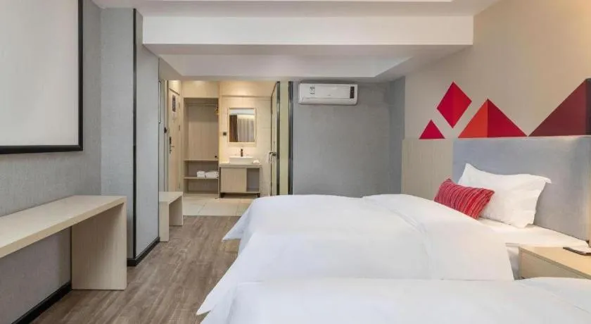 Bed in Borrman Hotel Dongguan Houjie Wanda Plaza Liaoxia Metro Station