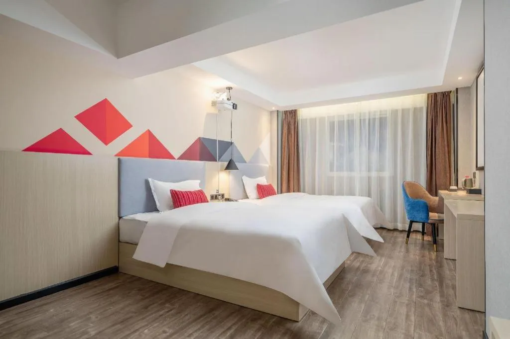 Bed in Borrman Hotel Dongguan Houjie Wanda Plaza Liaoxia Metro Station