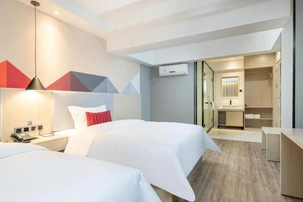 Bed in Borrman Hotel Dongguan Houjie Wanda Plaza Liaoxia Metro Station