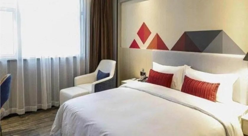 Bed in Borrman Hotel Dongguan Houjie Wanda Plaza Liaoxia Metro Station