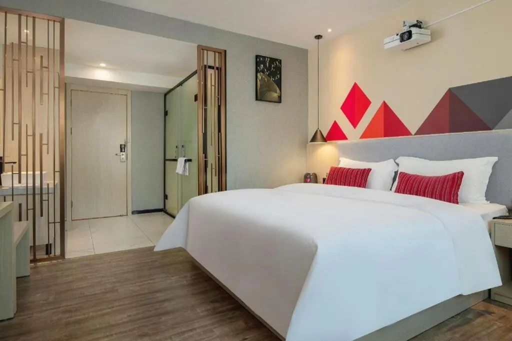 Bed in Borrman Hotel Dongguan Houjie Wanda Plaza Liaoxia Metro Station