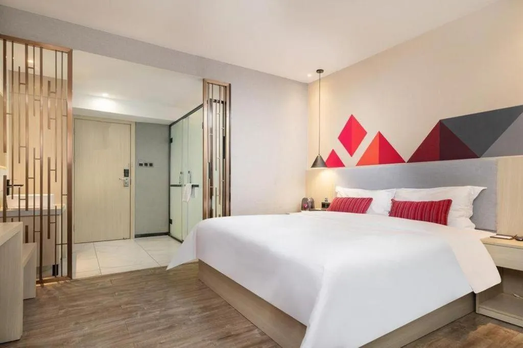 Bed in Borrman Hotel Dongguan Houjie Wanda Plaza Liaoxia Metro Station