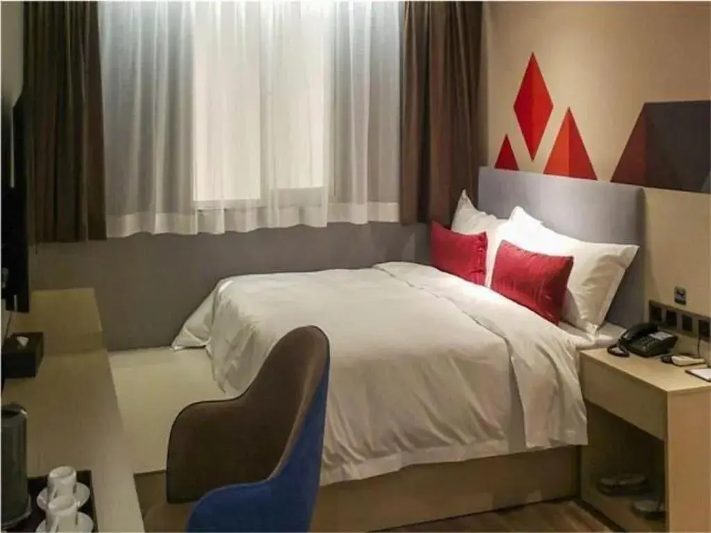 Bed in Borrman Hotel Dongguan Houjie Wanda Plaza Liaoxia Metro Station Bed in Borrman Hotel Dongguan Houjie Wanda Plaza Liaoxia Metro Station