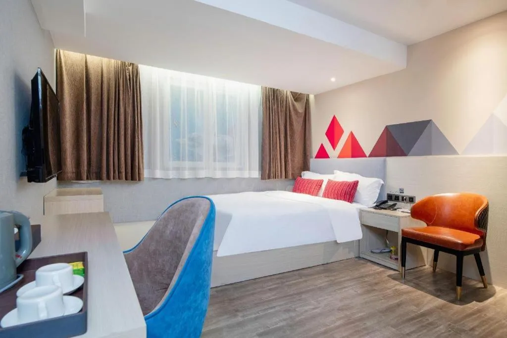 Bed in Borrman Hotel Dongguan Houjie Wanda Plaza Liaoxia Metro Station