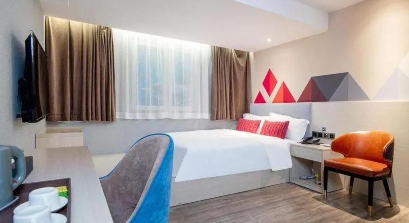 Bed in Borrman Hotel Dongguan Houjie Wanda Plaza Liaoxia Metro Station