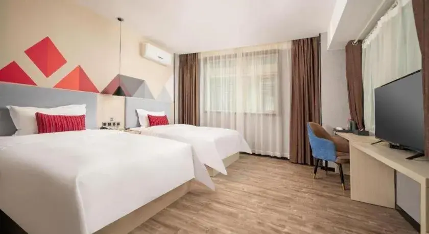 Bed in Borrman Hotel Dongguan Houjie Wanda Plaza Liaoxia Metro Station Bed in Borrman Hotel Dongguan Houjie Wanda Plaza Liaoxia Metro Station