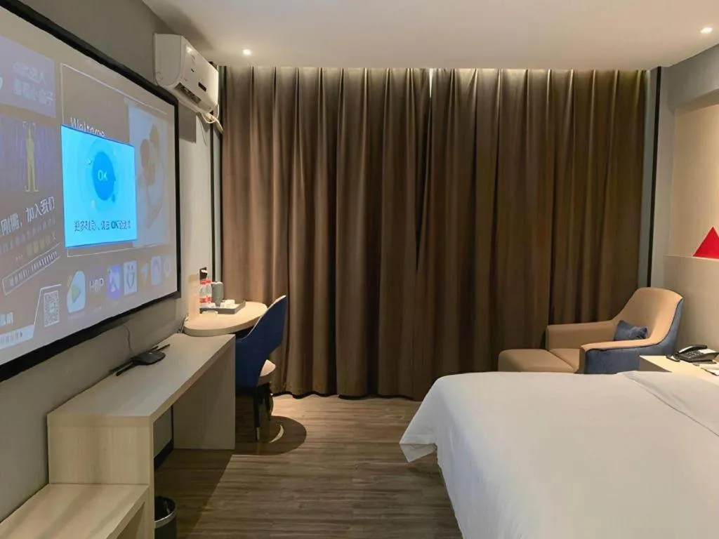 Bed in Borrman Hotel Dongguan Houjie Wanda Plaza Liaoxia Metro Station