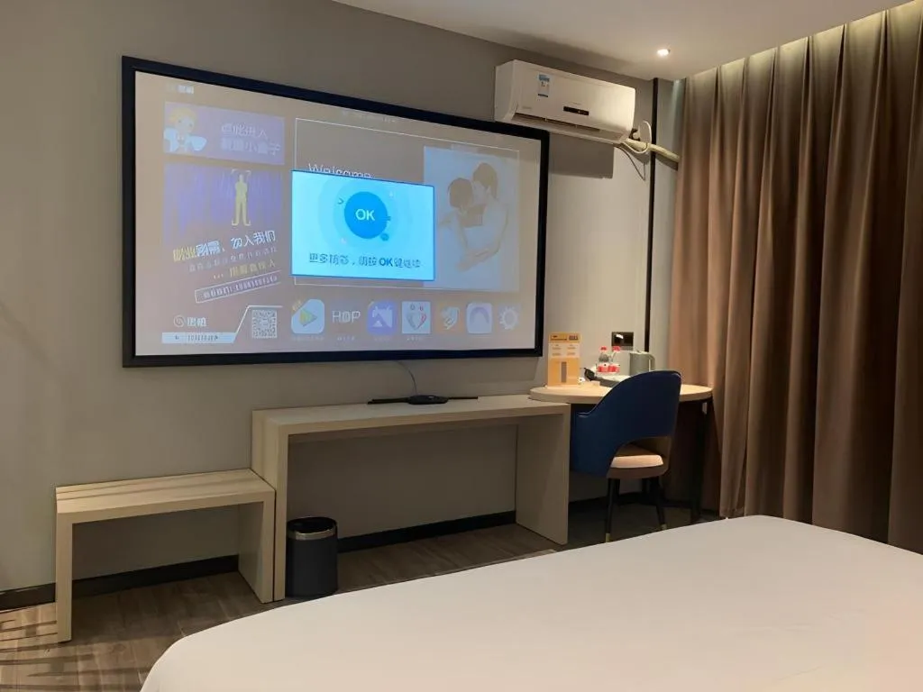 Bed in Borrman Hotel Dongguan Houjie Wanda Plaza Liaoxia Metro Station