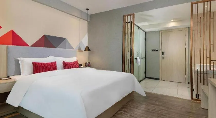 Bed in Borrman Hotel Dongguan Houjie Wanda Plaza Liaoxia Metro Station