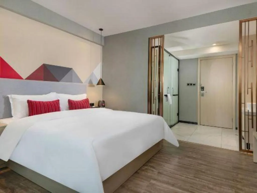 Bed in Borrman Hotel Dongguan Houjie Wanda Plaza Liaoxia Metro Station