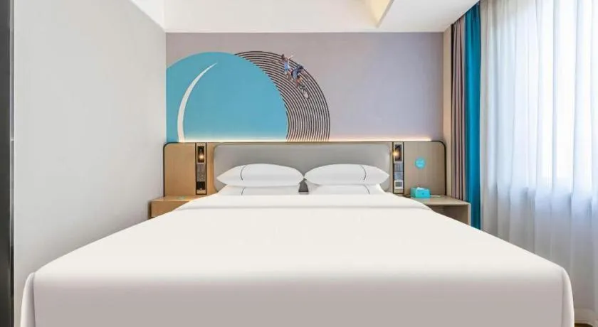 Bed in City Comfort Inn Kunming Xi'an Kang Road