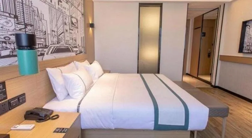 Bed in City Comfort Inn Kunming Xi'an Kang Road